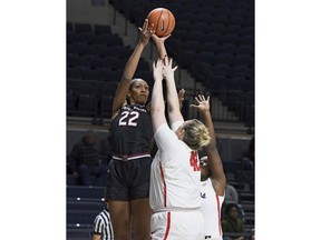 FILE - In this Jan. 4, 2018, file photo, South Carolina forward A'ja Wilson (22) takes a shot over Mississippi forward Shelby Gibson (42) during the first half of an NCAA college basketball game, in Oxford, Miss. Wilson was named to the Associated Press women's NCAA college basketball All-America first team, Monday, March 26, 2018.