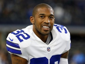 FILE - In this Aug. 27, 2017, file photo, Dallas Cowboys cornerback Orlando Scandrick (32) stands on the sideline during a preseason NFL football game against the Oakland Raiders, in Arlington, Texas. A person with direct knowledge of the move says the Washington Redskins have signed cornerback Orlando Scandrick to a two-year deal worth up to $10 million. The person spoke to The Associated Press on condition of anonymity Monday, March 19, 2018, because the team had not announced the deal.