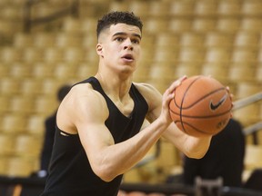 FILE - In this March 3, 2018, file photo, Missouri's Michael Porter Jr. shoots baskets before an NCAA college basketball game against Arkansas in Columbia, Mo. Porter will make his long-awaited return to the court following lower back surgery when Missouri opens at the Southeastern Conference Tournament on Thursday, March 8, 2018.