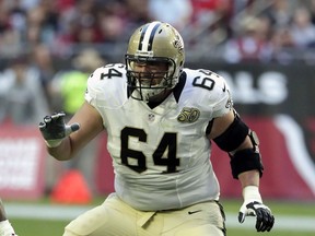 FILE - In this Dec. 18, 2016, file photo, New Orleans Saints tackle Zach Strief (64) follows the play during the first half of an NFL football game against the Arizona Cardinals, in Glendale, Ariz. Strief says he's retiring after 12 NFL seasons. Strief, who made a tearful announcement on Monday, in Metairie, La., says his career far exceeded his expectations.