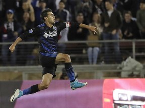 FILE - In this July 1, 2017, file photo, San Jose Earthquakes forward Chris Wondolowski leaps after scoring against the Los Angeles Galaxy during the second half of an MLS soccer match, in San Jose, Calif. Early in his 14th season in Major League Soccer, Chris Wondolowski no doubt knows the question is coming. About Landon Donovan. About the record. And about whether he'll break it.