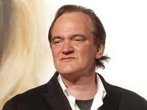 FILE - In this Oct. 8, 2016, file photo, director Quentin Tarantino appears at the opening ceremony of the eighth Lumiere Festival, in Lyon, central France. Brad Pitt and Leonardo DiCaprio are set to star in Tarantino's "Once Upon a Time in Hollywood." Sony Pictures said Wednesday, Feb. 28, 2018, that the film has been dated for a theatrical release on Aug. 9, 2019.