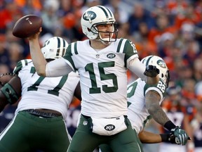 FILE - In this Dec. 10, 2017, file photo, New York Jets quarterback Josh McCown (15) throws against the Denver Broncos during the first half of an NFL football game Denver. The Jets and quarterback McCown have agreed on a one-year deal, McCown's agent Mike McCartney announced Tuesday, March 13, 2018, on Twitter.