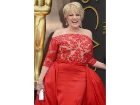 FILE - This March 2, 2014, file photo shows Lorna Luft at the Oscars in Los Angeles. Singer Luft, the daughter of Judy Garland, collapsed backstage after a concert in London, Friday, March 9, 2018, and was rushed to the hospital, where she was undergoing tests, a representative said.