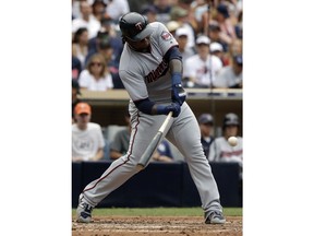 FILE - In this Aug.2, 2017, file photo, Minnesota Twins' Miguel Sano hits a home run during the sixth inning of a baseball game against the San Diego Padres in San Diego. Sano will not be suspended by Major League Baseball after being accused of assault. The commissioner's office said in a statement on Friday, March 23, 2018, that "there was insufficient evidence to support a disciplinary determination against Sano, due to conflicting and inconsistent witness accounts and the absence of contemporaneous substantiation."