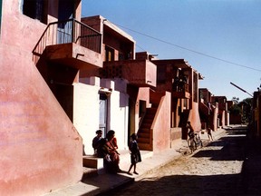 This photo provided by The Pritzker Architecture Prize shows the Aranya low-cost housing project by Balkrishna Doshi in Indore, India, which accommodates over 80,000 people through a system of houses, courtyards and internal pathways. Doshi of India won the 2018 Pritzker Architecture Prize, the highest honor in the field, announced Wednesday, March 7, 2018. (Courtesy of The Pritzker Architecture Prize/Vastushilpa Foundation  via AP)