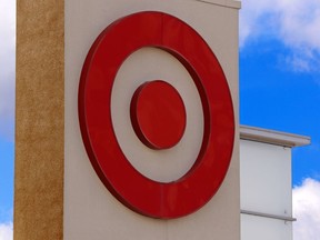FILE- This May 3, 2017, file photo shows the Target logo on a store in Upper Saint Clair, Pa. Target Corp. reports financial results on Tuesday, March 6, 2018.