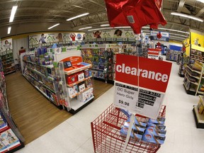FILE- This Jan. 24, 2018, file photo shows a Toys R Us store in Pittsburgh. Toys R Us is opening its doors with a going-out-of-business sale, offering clearance discounts at all 735 stores, including Babies R Us. The company did not say Friday, March 23, how big the discounts will be or when it expects stores to shut down.