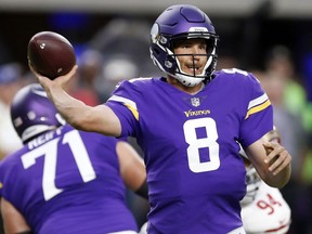 FILE -In this Aug. 27, 2017, file photo, Minnesota Vikings quarterback Sam Bradford throws a pass during the first half of an NFL preseason football game against the San Francisco 49ers in Minneapolis. The Arizona Cardinals have addressed their dire need at quarterback after signing Sam Bradford, though they may not be done at the position. Bradford, the No. 1 overall pick in the 2010 draft, is known for his strong and accurate arm, but he has struggled with injuries.