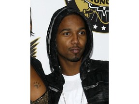 FILE - In this Oct. 2, 2008 file photo, Juelz Santana arrives at the VH1 Hip Hop Honors in New York. Authorities say Juelz Santana turned himself into Port Authority Police early Monday  after a gun was found in a carry-on bag containing his identification at a New York City area airport last week. He is due to appear in U.S. District Court in Newark later in the day.