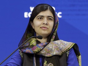 FILE- In this Jan. 25, 2018 file photo, Nobel laureate Malala Yousafzai attends the annual meeting of the World Economic Forum in Davos, Switzerland. Little, Brown Books for Young Readers told The Associated Press on Monday that Yousafzai's "We Are Displaced" will come out Sept. 4.