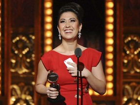 FILE - In this June 7, 2015 file photo, Ruthie Ann Miles accepts the award for best performance by an actress in a featured role in a musical for "The King & I" at the 69th annual Tony Awards in New York. Miles was injured and her 4-year-old daughter Abigail was killed along with a 1-year-old when a driver lost control of her vehicle and slammed into them on a Brooklyn street.  Police say Miles was walking with a friend who had the infant in a stroller when the driver struck them. Police say 1-year-old Joshua Lew was also killed.