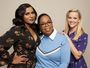 In this Feb. 25, 2018 photo, actors Mindy Kaling from left, Oprah Winfrey and Reese Witherspoon pose for a portrait at The W Hotel in Los Angeles to promote their film, "A Wrinkle in Time," opening nationwide on Friday.