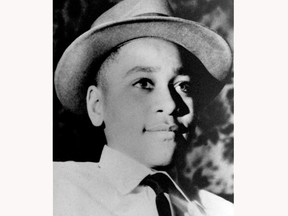 FILE - This undated photo shows Emmett Louis Till, a black 14-year-old Chicago boy, who was kidnapped, tortured and murdered in 1955 after he allegedly whistled at a white woman in Mississippi. Photos of his tortured body propelled the civil rights effort and is the subject of an NBC documentary ""Hope & Fury," premiering Saturday.  (AP Photo, File)