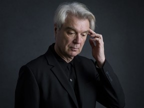 In this Feb. 16, 2018 photo, musician David Byrne poses for a portrait in New York to promote his album, "American Utopia," which will be released on Friday, March 9.
