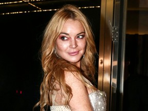 FILE - In this Oct. 16, 2016, file photo, actress Lindsay Lohan appears at the opening night of the Lohan Nightclub in Athens, Greece. Lohan sued a software company for using what she claims is a likeness of her in a video game. The New York Court of Appeals ruled Thursday, March 29, 2018, that the satirical representations of "a modern, beach-going" young woman are not identifiable as Lohan. The court affirmed a ruling from a lower state appeals court dismissing her lawsuit.