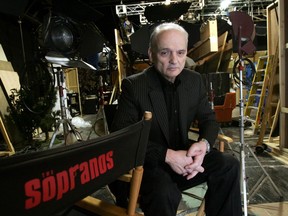 FILE - In this March 3, 2006 file photo, David Chase, creator and producer of the hit HBO series "The Sopranos," poses on a set in the Queens borough of New York. Warner Bros. Pictures says Thursday that New Line has purchased a screenplay for a "Sopranos" prequel from series creator David Chase and Lawrence Konner. The studio says the working title is "The Many Saints of Newark" and will be set in the 1960s during the Newark riots. Chase's acclaimed series about the mobster Tony Soprano played by the late James Gandolfini ran for six seasons on HBO and won 21 primetime Emmys.