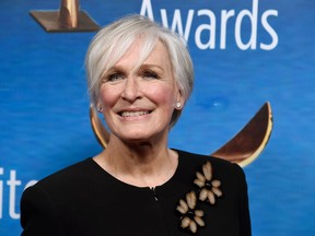 FILE - In this Feb. 11, 2018 file photo, actress Glenn Close poses at the 2018 Writers Guild Awards in Beverly Hills, Calif. The Emmy- and Tony-award-winning actress is in Ann Arbor, Michigan, for a gathering designed to bring awareness to efforts aimed at reducing the stigma surrounding mental illness.