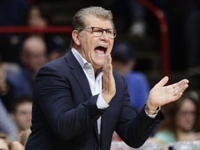 Connecticut head coach Geno Auriemma calls out to his team during the first half in a regional semifinal against Duke at the NCAA women's college basketball tournament Saturday, March 24, 2018, in Albany, N.Y.