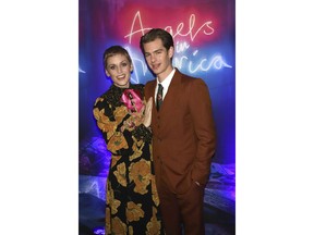 Denise Gough, left, and Andrew Garfield attend the after party for the "Angels in America" Broadway revival opening night at Espace on Sunday, March 25, 2018, in New York.