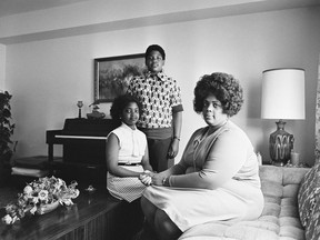 In this April 30, 1974, file photo, Linda Brown, right, and her two children pose for a photo in their home in Topeka, Kan. Brown, the Kansas girl at the center of the 1954 U.S. Supreme Court ruling that struck down racial segregation in schools, has died at age 76. Peaceful Rest Funeral Chapel of Topeka confirmed that Linda Brown died Sunday, March 25, 2018.