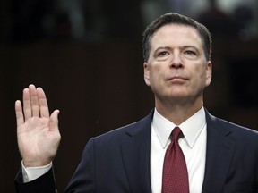 FILE - In this June 8, 2017 file photo, former FBI Director James Comey is sworn in during a Senate Intelligence Committee hearing on Capitol Hill in Washington. ABC announced Sunday, March 4, 2018, it will air a special interview with Comey in April before the former FBI director's book is released.