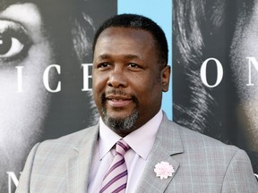 FILE - In this March 31, 2016 file photo, Wendell Pierce, a cast member in "Confirmation," poses at the premiere of the HBO film in Los Angeles. Pierce has announced that the grand opening of an apartment complex will be next month. The Baltimore Sun reports Pierce said in a tweet, "Grand Opening of The Nelson Kohl Apartments 20 E. Lanvale. April 6th 11:30am. Come and join me as we cut the ribbon!!!"