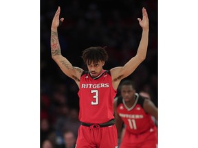 Rutgers guard Corey Sanders (3) reacts after scoring against Purdue during the first half of an NCAA Big Ten Conference tournament college basketball game, Friday, March 2, 2018, in New York.