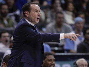 Duke coach Mike Krzyzewski gestures during the second half of the team's NCAA college basketball game against North Carolina in the Atlantic Coast Conference men's tournament semifinals Friday, March 9, 2018, in New York. North Carolina won 74-69.