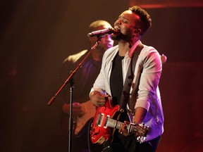 FILE- In this Oct. 11, 2016, file photo, Travis Greene performs at the 47th Annual GMA Dove Awards at Lipscomb University in Nashville, Tenn. Greene took home artist of the year and three other trophies at the Stellar Awards.