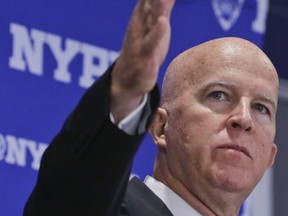 FILE - In this July 6, 2017 file photo, New York Police Department Commissioner James O'Neill gestures during a news conference following a swearing-in ceremony for new police recruits entering the Police Academy in New York. The NYPD special victims division, tasked with investigating rape allegations against media mogul Harvey Weinstein and many other cases, is chronically understaffed and many sexual assault cases are not properly reviewed, according to a report Tuesday March 26, 2018, by a city watchdog agency. Police officials strongly disputed the findings of the report, and O'Neill said "Our special victims unit is universally recognized as the premiere special victims unit in the world ... definitely in the country."