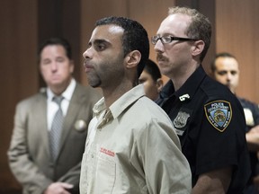 FILE- In this Tuesday, Aug. 16, 2016 file photo Oscar Morel appears in a Queens courtroom in New York. Morel was convicted Friday, March 23, 2018, of first-degree murder for the broad daylight killings of a Muslim cleric Imam Maulana Akonjee and his assistant Thara Uddin.