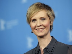 FILE - In this Sunday, Feb. 14, 2016, file photo, Actress Cynthia Nixon poses for the photographers during a photo call for the film 'A Quiet Passion' at the 2016 Berlinale Film Festival in Berlin, Germany. The former "Sex and the City" star says she'll challenge Gov. Andrew Cuomo in New York's Democratic primary in September. Her announcement Monday, March 19, 2018, sets up a race pitting an openly gay liberal activist against a two-term incumbent with a $30 million war chest and possible presidential ambitions.