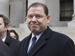 Joseph Percoco, a former top aide to New York Gov. Andrew Cuomo accused of bribery, leaves Federal court in New York, Monday, March 12, 2018. Jurors have finished another day of deliberations after a second deadlock.