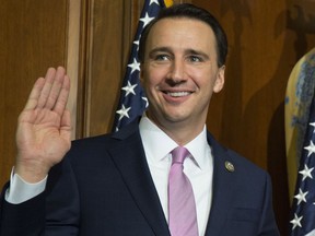 FILE - In this Tuesday, Jan. 3, 2017, file photo, U.S. Rep. Ryan Costello, R-Pa., participates in a mock swearing-in ceremony on Capitol Hill in Washington. Costello announced on Sunday, March 25, 2018, that he would not be seeking re-election, ending weeks of speculation about his future and boosting Democratic hopes of winning his House seat.