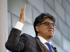 FILE - In this Oct. 10, 2016, file photo, author and filmmaker Sherman Alexie speaks at an event at Seattle's City Hall. Alexie's publisher, Hachette Book Group, is postponing the paperback of his latest book. Hachette told The Associated Press on Sunday, March 11, 2018, that the date has been pushed back indefinitely and that the change was made at the author's request.