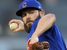 File-This may 26, 2017, file photo shows Chicago Cubs starting pitcher Jake Arrieta throwing to the plate during the first inning of a baseball game against the Los Angeles Dodgers, in Los Angeles. Two people familiar with the deal tell The Associated Press that free agent ace Arrieta and the Philadelphia Phillies have agreed to a three-year deal. Both people spoke to the AP on condition of anonymity Sunday because the contract is pending a physical. The deal is reportedly worth $75 million.