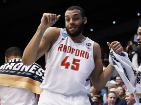 Radford's Darius Bolstad (45) dances in the final moments of the second half of a First Four game of the NCAA men's college basketball tournament against LIU Brooklyn, Tuesday, March 13, 2018, in Dayton, Ohio. Radford won 71-61.