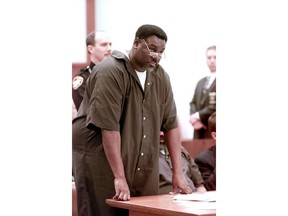 In this April 6, 2000 file photo, Nathaniel Cook stands during his sentencing at Lucas County Courthouse in Toledo, Ohio. Nathaniel Cook, one of two brothers who admitted killing a 12-year-old girl during a string of murders in the early 1980s could get out of prison within months.  Cook admitted he took part in three of those slayings with his brother, Anthony Cook, who's now serving two life sentences.  A judge has set a hearing for Thursday, March 8, 2018, to begin determining whether Cook should be registered as a sex offender if he's released.