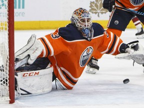 Edmonton Oilers' goaltender CamTalbot makes one of his 33 saves on the night in a 4-3 overtime victory over the Arizona Coyotes in NHL action Monday night at Rogers Place.