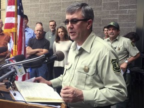 In a Sept. 9, 2017 photo, Tony Tooke, chief of the U.S. Forest Service, speaks at a news conference, in Troutdale, Ore. Tooke has stepped down after an investigation was launched into sexual misconduct allegations against him. A Forest Service spokesman on Thursday, March 8, 2018, confirmed Tooke's sudden retirement just seven months after he took over an agency.