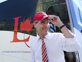 Liberal Leader Michael Ignatieff steps off his Liberal Express bus as he greets  senators and members of the Liberal Caucus outside of Parliament in Ottawa Sept 20, 2010.