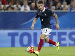 FILE - In this Sept.7, 2015 file photo, France's Mathieu Debuchy, controls the ball during a friendly soccer match France against Serbia in Bordeaux, western France. In many ways, Saint-Etienne's actual good run of form is down to the resurgence of Mathieu Debuchy, who has made an impressive return to the French league. With less than four months before the World Cup in Russia, the former Arsenal player has a decent chance to earn a France recall.