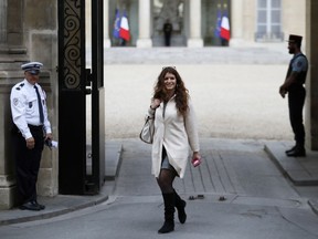 FILE - In this May 18, 2017 file photo, French deputy minister in charge of Equality Between Women and Men Marlene Schiappa leaves the Elysee Palace in Paris. France's government presents Wednesday March 21 2018 a bill to fight against sexual and gender-based violence, in the wake of the #MeToo movement. Schiappa said last week in an interview to the AP the measure aims at imposing stiff fines for gender-based harassment on the street or in public transport.