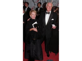 FILE - In this Feb.12 1996 file photo, Hubert de Givenchy arrives with his wife, Mary, at the Council of Fashion Designers of America 1996 Awards Gala at Lincoln Center in New York. French couturier Hubert de Givenchy, a pioneer of ready-to-wear who designed Audrey Hepburn's little black dress in "Breakfast at Tiffany's," has died at the age of 91.
