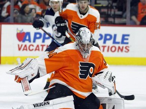 Philadelphia Flyers' Petr Mrazek deflects a shot on goal during the third period of an NHL hockey game against the Winnipeg Jets Saturday, March 10, 2018, in Philadelphia. The Flyers won 2-1.