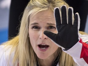 Canada skip Jennifer Jones calls off the sweep as they face The Czech Republic during the World Women's Curling Championship in North Bay, Ont., Saturday, March 17, 2018.