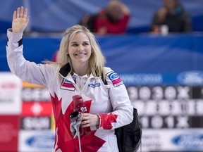 Canada skip Jennifer Jones waves to the crowd as she leaves the ice after defeating Japan at the World Women's Curling Championship Friday, March 23, 2018 in North Bay, Ont.