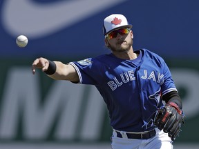 Toronto Blue Jays third baseman Josh Donaldson throws out a Philadelphia Phillies baserunner on March 21.