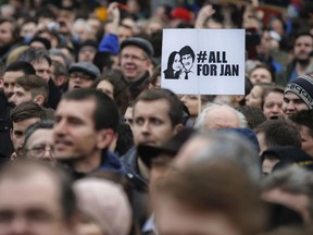 FILE - In this Friday, March 16, 2018 file photo, people celebrate the resignation of Prime Minister Robert Fico and his government as a way out of the political crisis during a rally in Bratislava, Slovakia. It was report on Tuesday, March 20, 2018 that Slovakia's president Andrej Kiska has rejected a proposal for a new government amid a crisis triggered by the slayings of investigative journalist Jan Kuciak and his fiancee Martina Kusnirova.